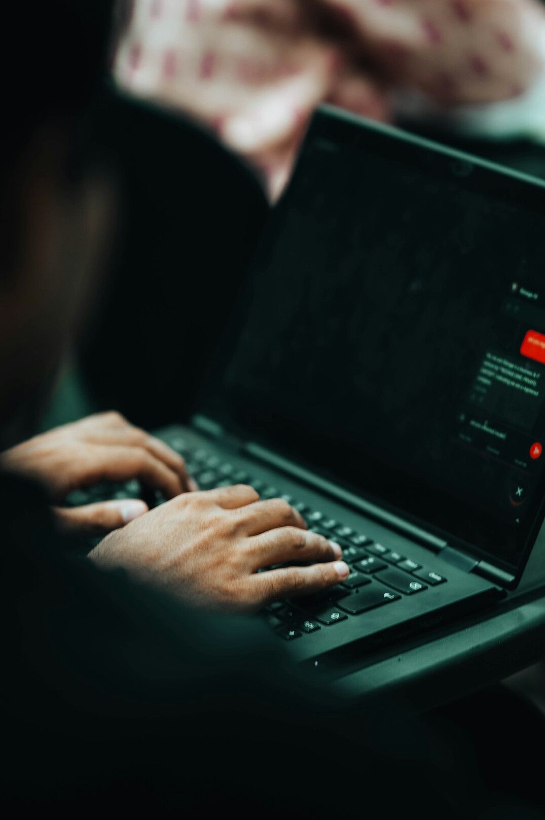person learning to code on laptop