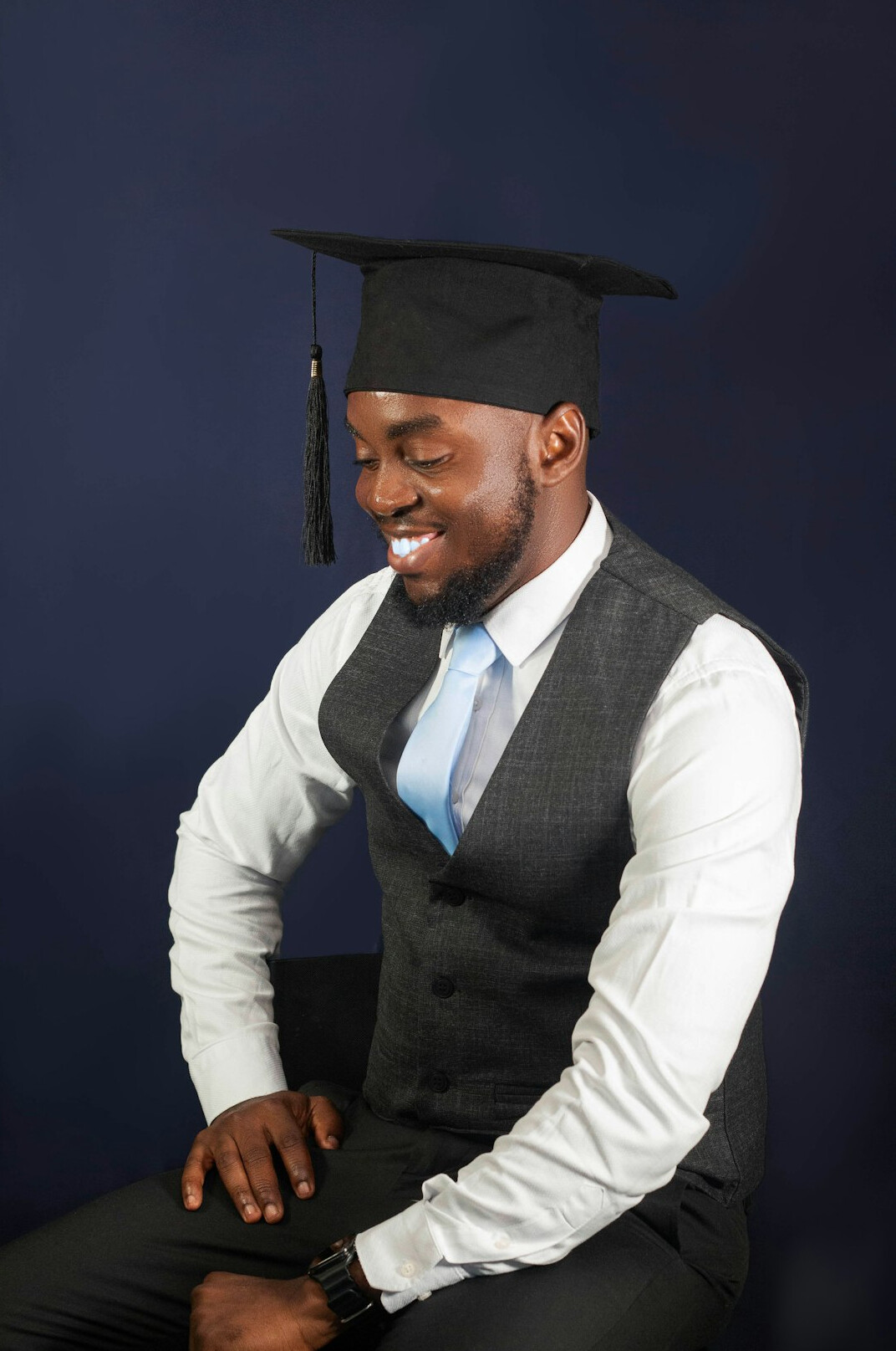 successful graduate smiling