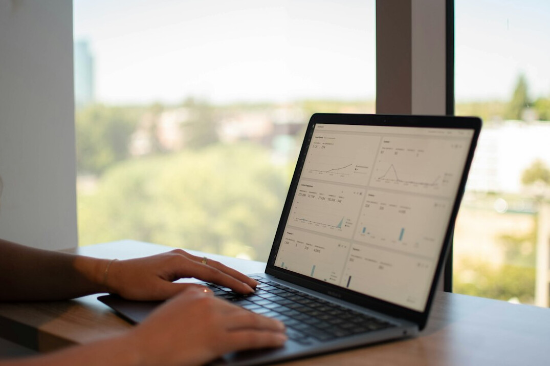 person learning to code on laptop